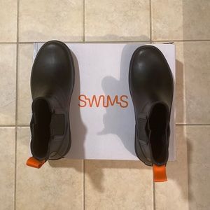 Men’s short rubber boots. Swims brand never worn. Brand new with box.